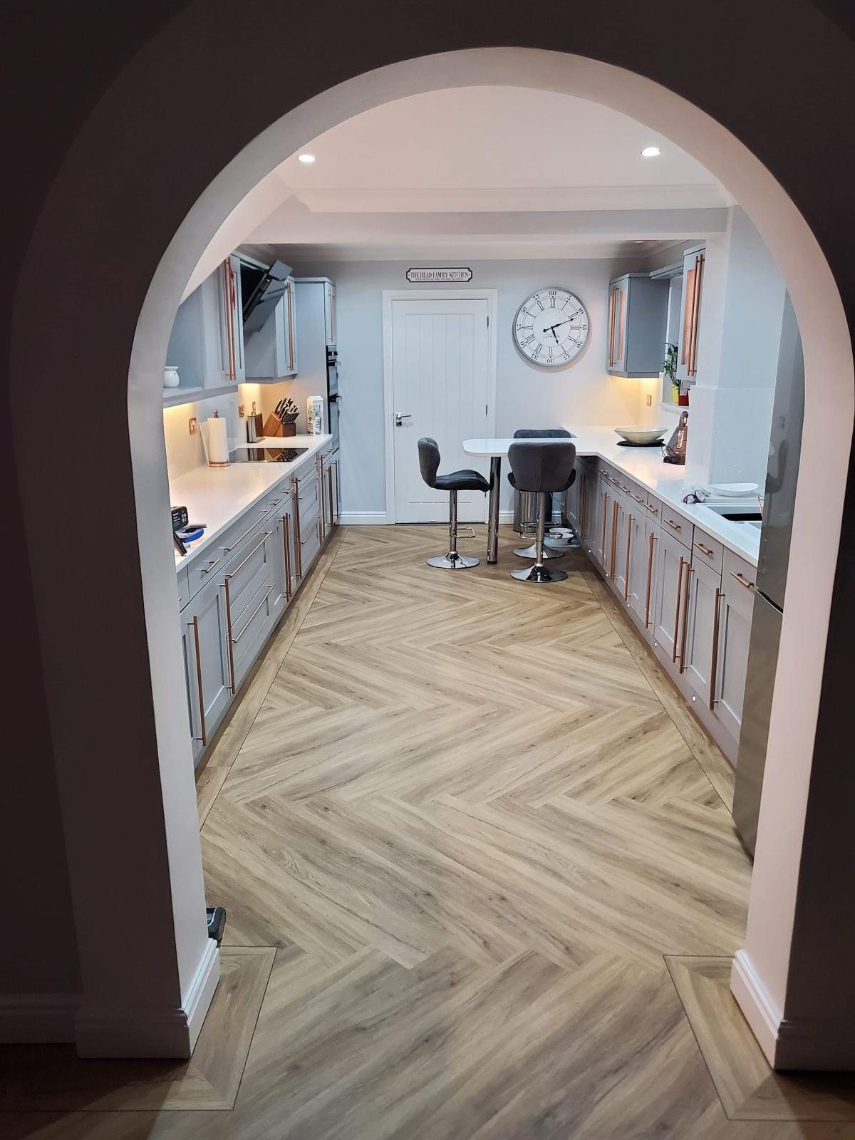 Arctic Starburst kitchen seen through the arch from the hallway